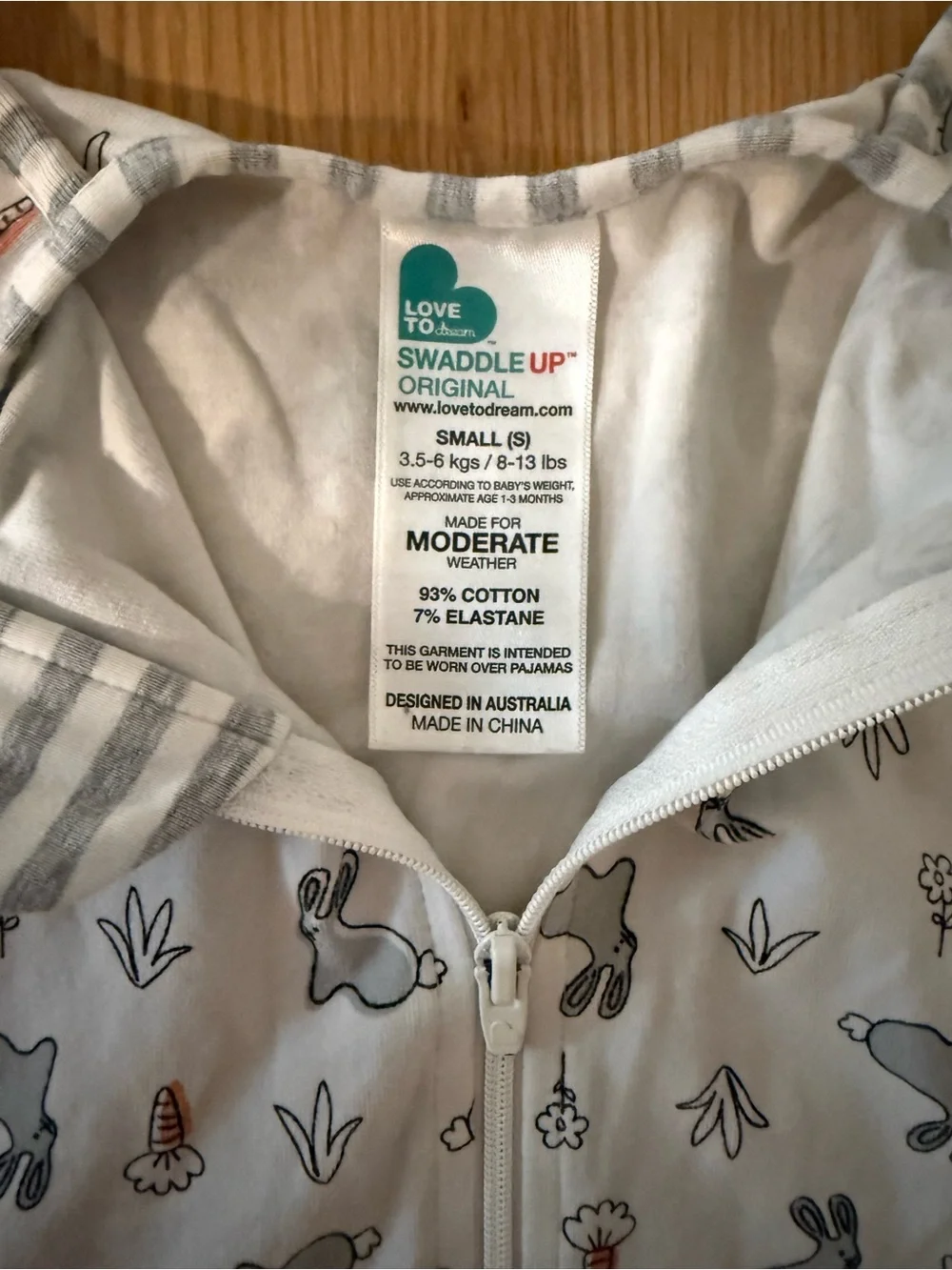 Love To Dream White Swaddle with Grey Bunny and Orange Carrot Print